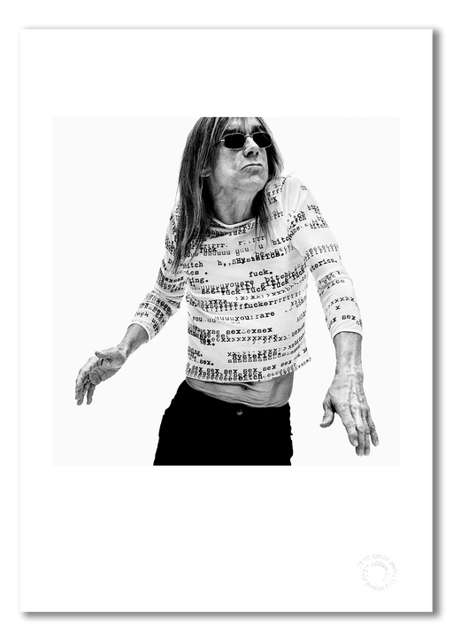 B&W portrait of Iggy Pop dancing in profanity-covered shirt by Gavin Evans, 1996. A3 giclée print with white border, Iggy Pop Collection.