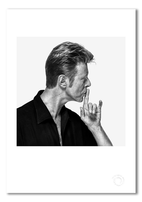 David Bowie profile portrait by Gavin Evans, 1995. Finger to lips in shushing pose. A3 giclée with white border, Bowie Collection.