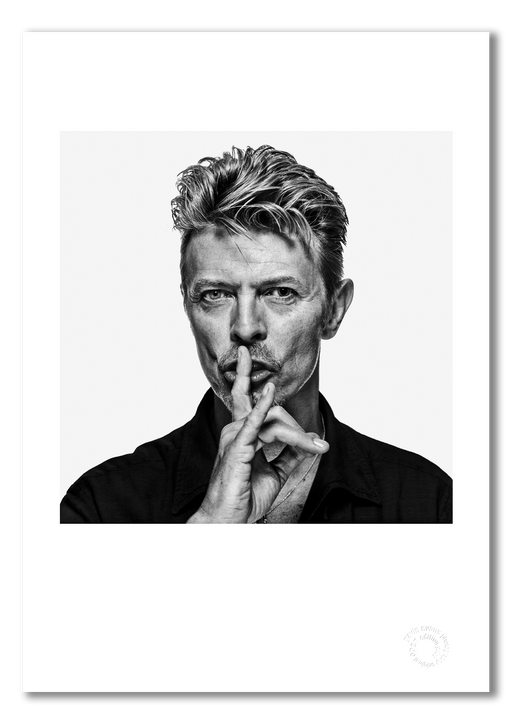Iconic “Shh” portrait of David Bowie by Gavin Evans. Finger to lips, calming gaze. A3 giclée print with white border, David Bowie Collection.