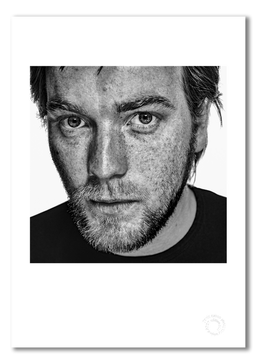 Black and white A3 print of Ewan McGregor by Gavin Evans, 1999. Wistful close-up studio portrait, Icons Collection. Shown as A3 giclée print with white border, embossed for authenticity.