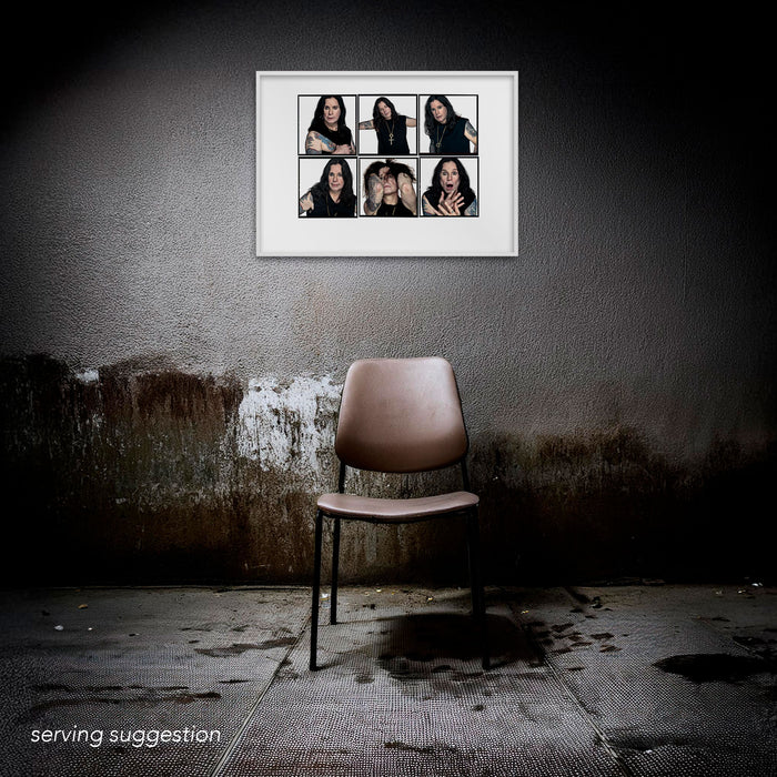 Framed A2 Lightbox of Ozzy Osbourne by Gavin Evans. 2005 studio portraits with white background and rock icon gestures. Displayed in dilapidated monochrome room, Lightbox Collection.