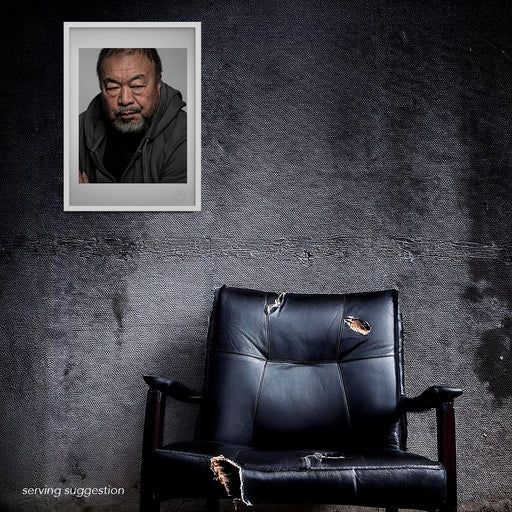 Framed portrait of Ai Weiwei by Gavin Evans, 2018. Personal studio image in aban room display, Icons Collection.oned