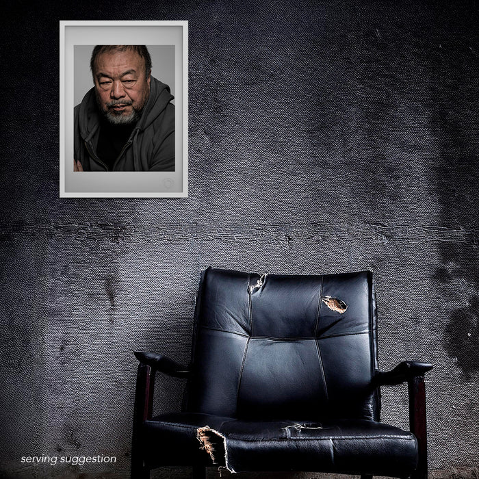 Framed portrait of Ai Weiwei by Gavin Evans, 2018. Personal studio image in aban room display, Icons Collection.oned