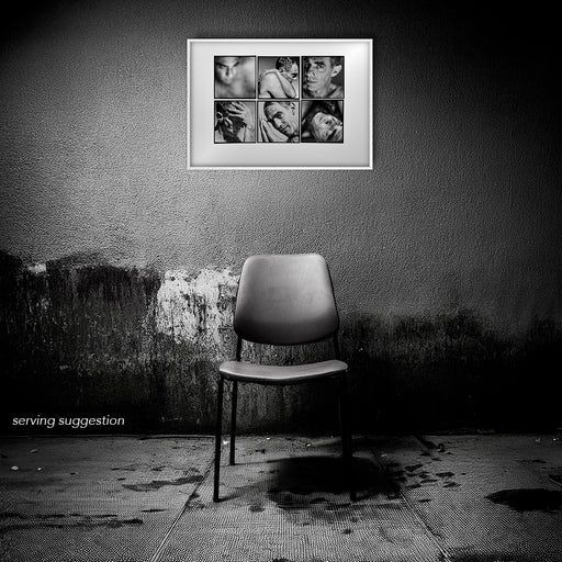 Framed B&W Lightbox of Derek Jarman by Gavin Evans. Six intimate studio portraits, 1993. Displayed in dilapidated room, Lightbox Collection.