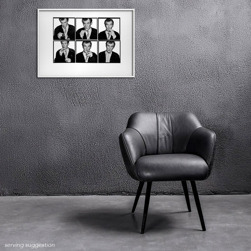 Framed A2 Lightbox of Sir Ian McKellen by Gavin Evans. B&W 1996 sequence lighting a cigarette. Displayed in monochrome room, Lightbox Collection.