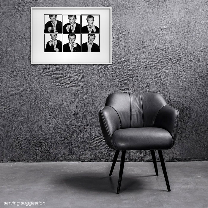 Framed A2 Lightbox of Sir Ian McKellen by Gavin Evans. B&W 1996 sequence lighting a cigarette. Displayed in monochrome room, Lightbox Collection.