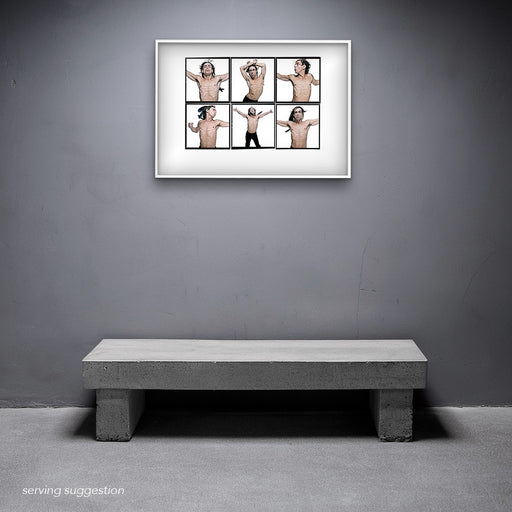 Framed A2 Lightbox of Iggy Pop by Gavin Evans. Colour portraits from 1996 feathered dance series. Displayed in a monochrome room, Lightbox Collection.