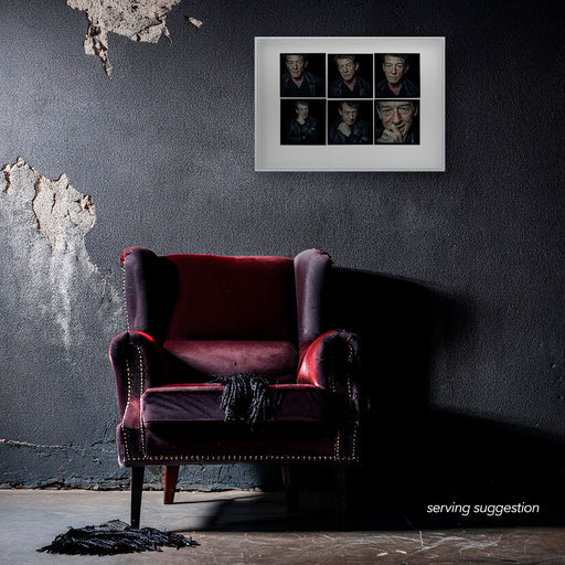 Framed A2 Lightbox of John Hurt by Gavin Evans. Intimate colour close-ups from 1997. Displayed in dilapidated monochrome room, Lightbox Collection.