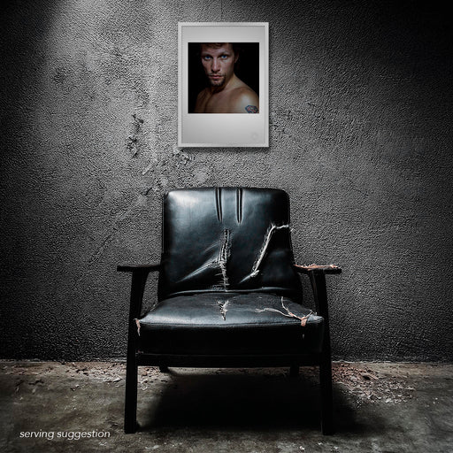 Framed Jon Bon Jovi portrait by Gavin Evans, 1996. Bare-chested image in distressed setting, soft and striking, Icons Collection.