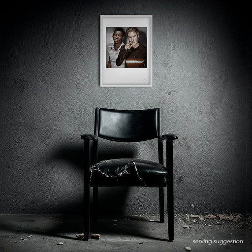 Framed portrait of Massive Attack’s founding members by Gavin Evans, 1997. Colour studio image in distressed setting, Icons Collection.