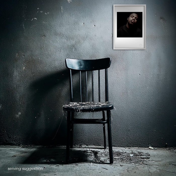 Framed version of the Masta Killa A3 fine art print displayed in a dilapidated room setting. The background and sharp composition contrast beautifully with the raw space, amplifying the visual power of this iconic 1997 portrait.