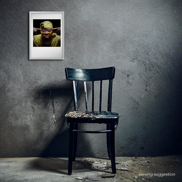 Framed Method Man portrait by Gavin Evans, 1997. Wearing yellow jacket and sunglasses, posed against black in raw interior, Icons Collection.
