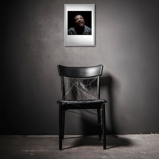 Framed A3 fine art print of Ol’ Dirty Bastard in a distressed room. The colour image’s chaotic power contrasts sharply with the worn interior, amplifying its raw, unpredictable energy.