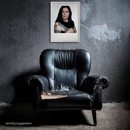 Framed Ozzy Osbourne portrait by Gavin Evans, 2005. Colour image with intense gaze and stark contrast, displayed in distressed setting, Icons Collection.