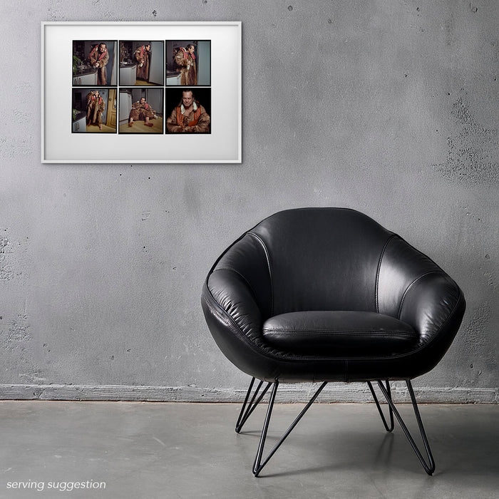 Framed colour Lightbox of Terry Gilliam by Gavin Evans. 1996 fur coat kitchen shoot. Displayed in monochrome room, Lightbox Collection.