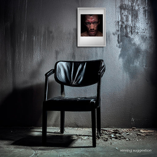 Colour close-up headshot of Tricky by Gavin Evans, 1996. Blood cross on forehead, emerging from black. Iconoclastic image, Icons Collection. Displayed framed in a distressed room setting for visual context.