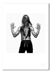 Iggy Pop #4, shot from behind, bare back, crow feathers, black and white, London 1996, by Gavin Evans — fine art photography print