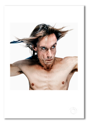 Iggy Pop #7, bare-chested, crow feathers, colour, white background, London 1996, by Gavin Evans — fine art photography print