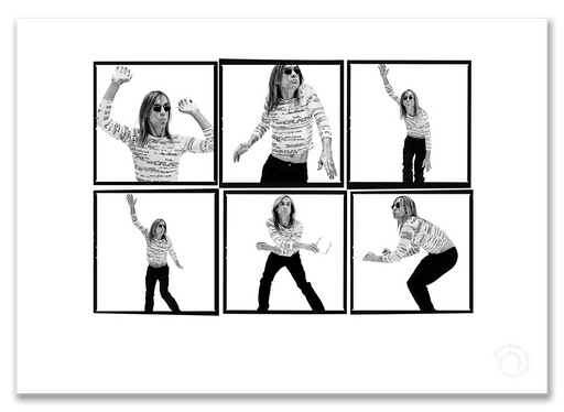 Iggy Pop Lightbox #2, mid-dance, profanity-print shirt, black and white, London 1996, by Gavin Evans — A2 fine art photography print