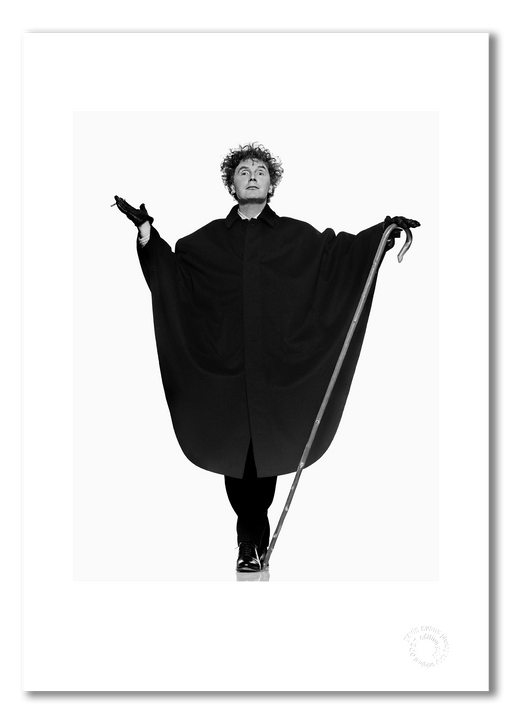 Malcolm McLaren, Sex Pistols, black and white full-length, white background, London 1992, by Gavin Evans — fine art photography print