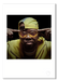 Colour portrait of Method Man by Gavin Evans, 1997. Yellow jacket, sunglasses, forefingers to temples. A3 giclée with white border, Icons Collection.
