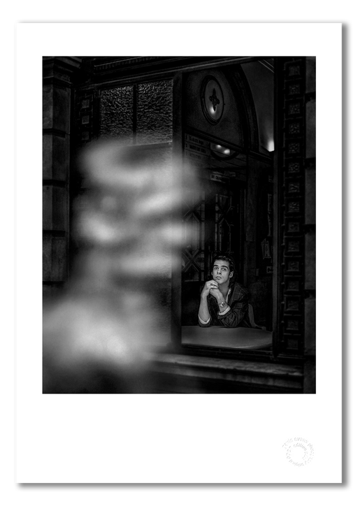 Nick Cave #2, seated at window, ghostly figure entering frame, black and white, Bayswater London 1989, by Gavin Evans — fine art photography print