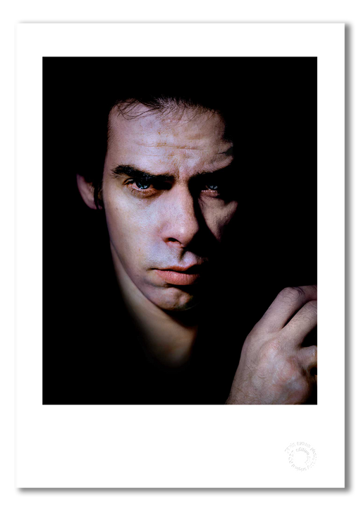 Nick Cave #6, direct gaze, close-up, colour, black background, Bayswater London 1989, by Gavin Evans — fine art photography print