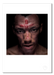 Colour close-up headshot of Tricky by Gavin Evans, 1996. Blood cross on forehead, emerging from black. Iconoclastic image, Icons Collection. Shown as A3 giclée print with white border, embossed for authenticity.
